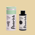 Flourish organic all-purpose plant food packaging on a plain background