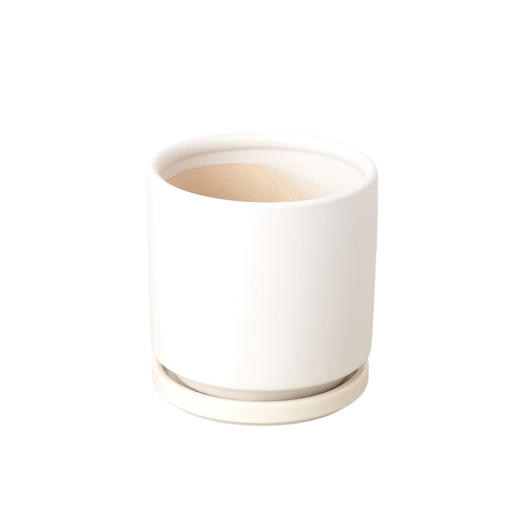 White ceramic pot on a white background