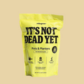 Yellow bag of mitogrow product with text 'It's Not Dead Yet' on a white background