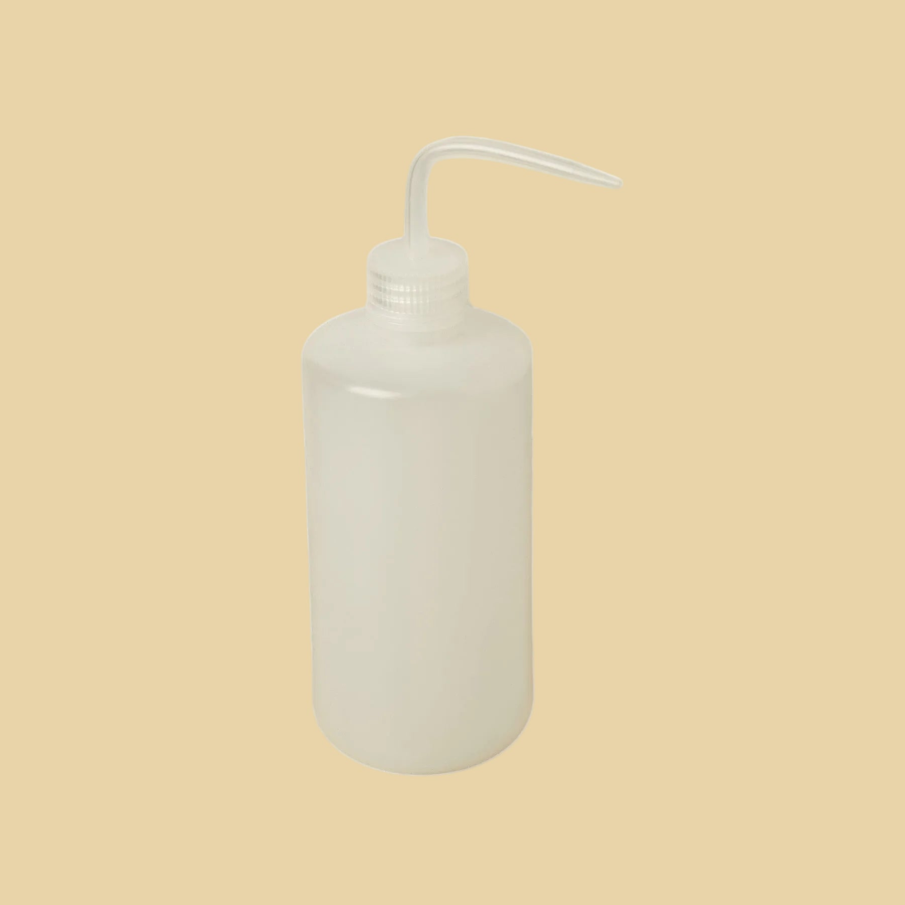 White plastic bottle with a pump dispenser on a white background