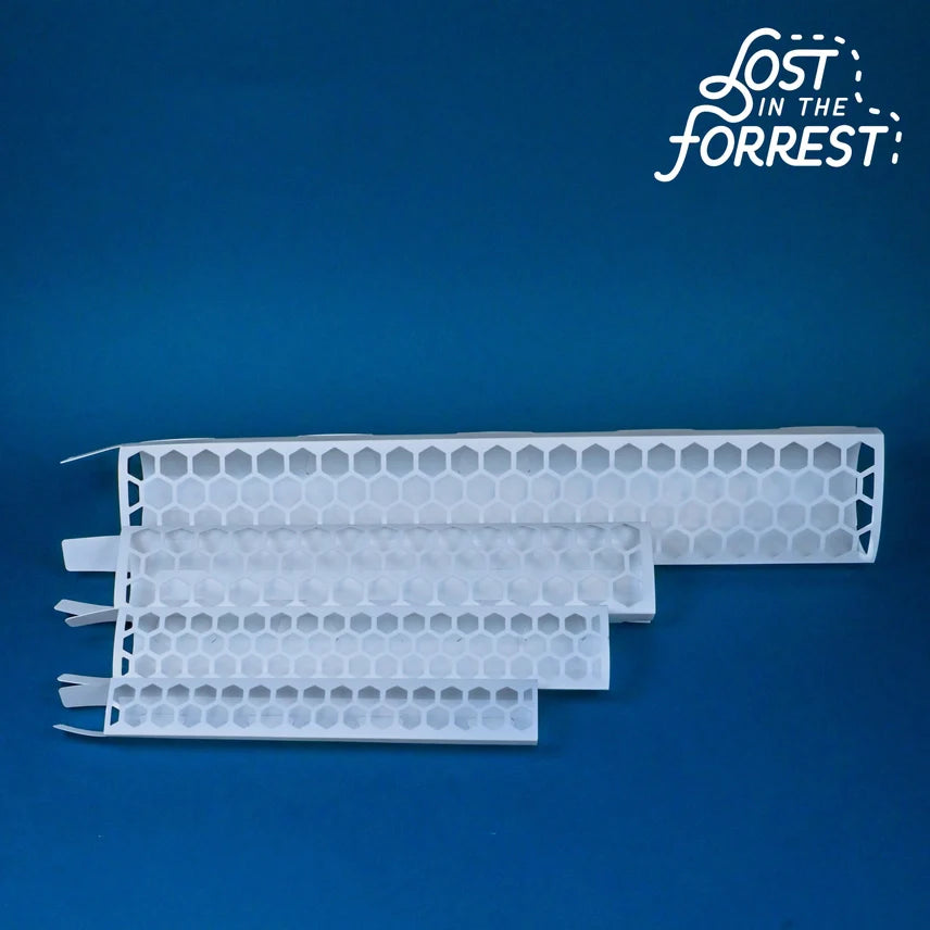 White honeycomb filter on a blue background with 'Lost in the Forrest' logo.